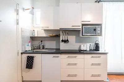 Cuisine ou kitchenette dans l'établissement GuestReady - Havre de paix près de Montmartre