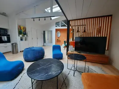Télévision ou salle de divertissement dans l'établissement Loft 4-5 personnes à Montmartre - parking privé sur réservation