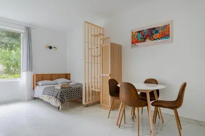 Un ou plusieurs lits dans un hébergement de l'établissement Modern apartment next Arc de Triomphe