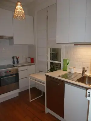 Cuisine ou kitchenette dans l'établissement Au coeur de Paris