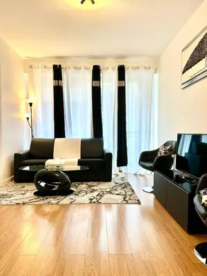 Coin salon dans l'établissement Champs elysees apartment 4