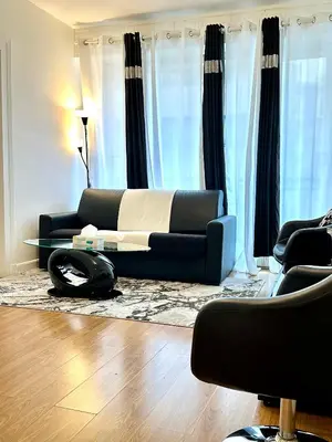 Coin salon dans l'établissement Champs elysees apartment 4