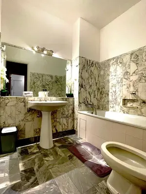 Salle de bains dans l'établissement Champs elysees apartment 4