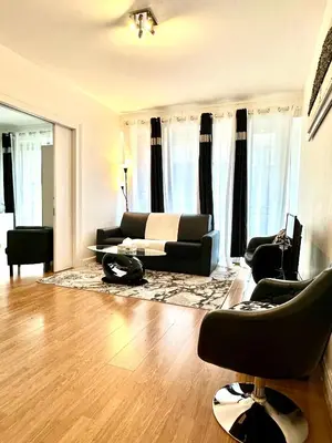 Coin salon dans l'établissement Champs elysees apartment 4