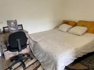 Un ou plusieurs lits dans un hébergement de l'établissement Cosy appart à balcon Tour Eiffel et parking