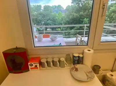 Balcon ou terrasse dans l'établissement Cosy appart à balcon Tour Eiffel et parking