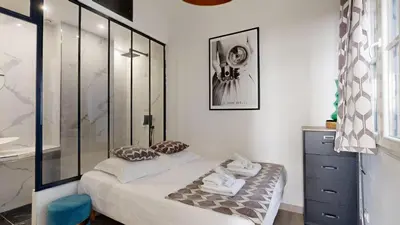 Un ou plusieurs lits dans un hébergement de l'établissement Bluestay 13 - Charmant appartement à Paris
