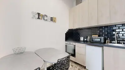 Cuisine ou kitchenette dans l'établissement Bluestay 13 - Charmant appartement à Paris