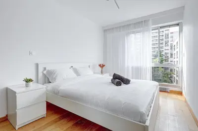 Un ou plusieurs lits dans un hébergement de l'établissement Suite au Cœur de Paris, Architecturale et Élégante