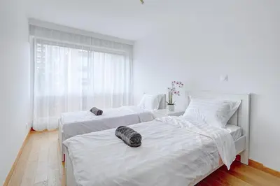 Un ou plusieurs lits dans un hébergement de l'établissement Suite au Cœur de Paris, Architecturale et Élégante