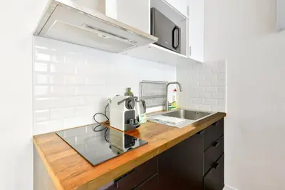Cuisine ou kitchenette dans l'établissement GuestReady - Apt. Vintage au centre de Paris