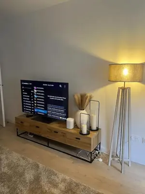 Télévision ou salle de divertissement dans l'établissement Modern apartment with terrace