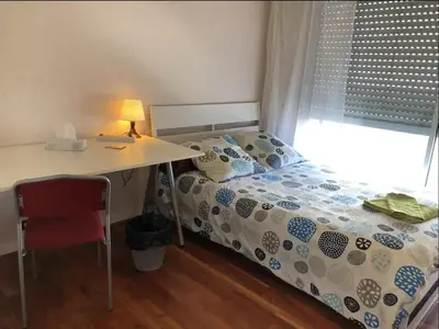 Un ou plusieurs lits dans un hébergement de l'établissement Appartement 2 chambre proche du métro convention