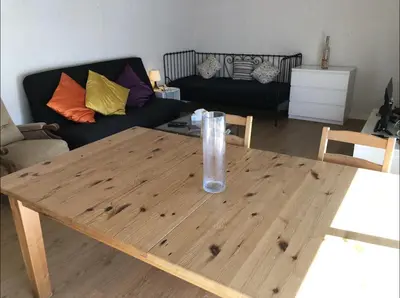 Coin salon dans l'établissement Appartement 2 chambre proche du métro convention
