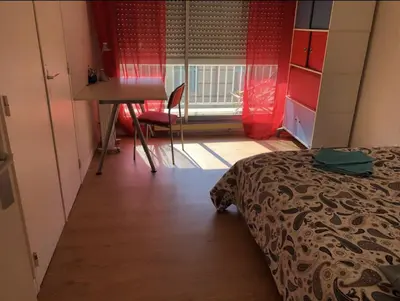 Un ou plusieurs lits dans un hébergement de l'établissement Appartement 2 chambre proche du métro convention