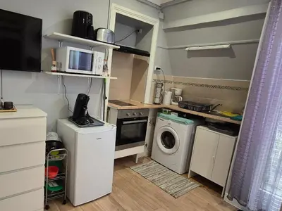 Cuisine ou kitchenette dans l'établissement Joli studio parisien