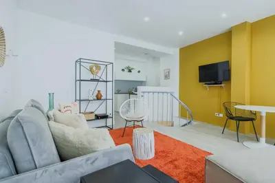 Télévision ou salle de divertissement dans l'établissement Apartment for 4, between Opera and Montmartre