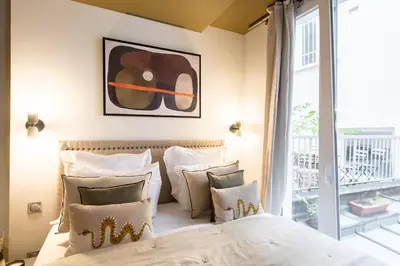 Un ou plusieurs lits dans un hébergement de l'établissement Room Aboukir, Paris Centre