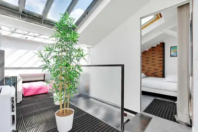Un ou plusieurs lits dans un hébergement de l'établissement Somptuous Apartement Terrace-3BR-6PCenter of Paris