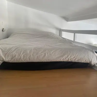 Un ou plusieurs lits dans un hébergement de l'établissement Studio au cœur de Montmartre