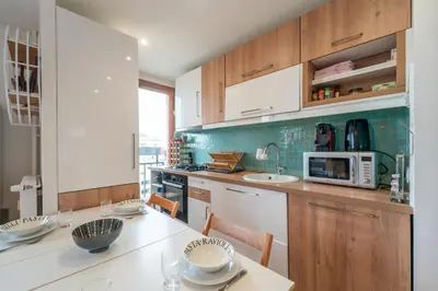 Cuisine ou kitchenette dans l'établissement Blue Light - Appt pour 4p Paris