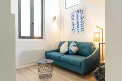 Coin salon dans l'établissement Loft house 2 BR Bastille AC by LCC Agency