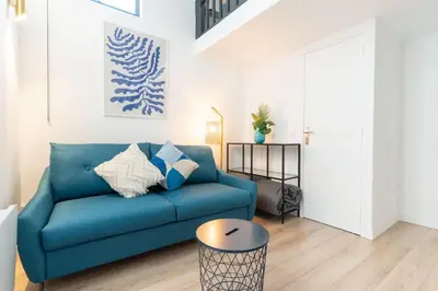 Coin salon dans l'établissement Loft house 2 BR Bastille AC by LCC Agency