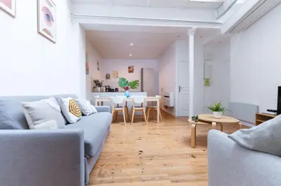 Coin salon dans l'établissement Loft house 2 BR Bastille AC by LCC Agency