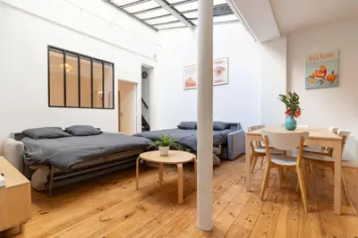 Coin salon dans l'établissement Loft house 2 BR Bastille AC by LCC Agency