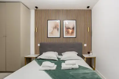 Un ou plusieurs lits dans un hébergement de l'établissement L'Escapade Bastille - Appartement proche Marais