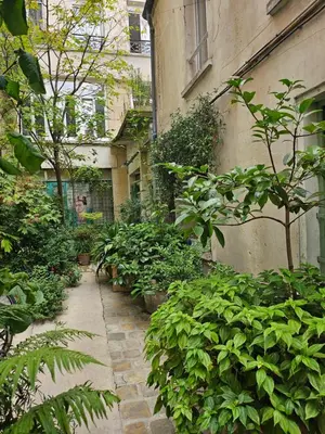 Jardin de l'établissement L'Escapade Bastille - Appartement proche Marais