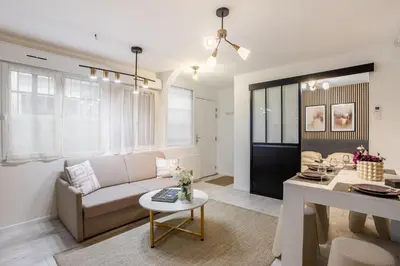 Coin salon dans l'établissement L'Escapade Bastille - Appartement proche Marais