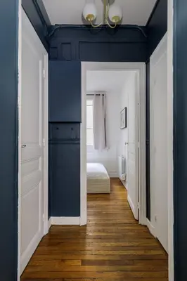 Un ou plusieurs lits dans un hébergement de l'établissement New Snug flat in the Heart of Le Marais