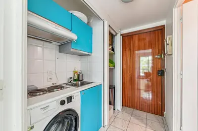 Cuisine ou kitchenette dans l'établissement Chic studio Champs-élysées