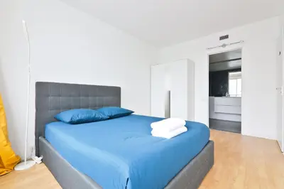 Un ou plusieurs lits dans un hébergement de l'établissement Appartement Quartier Tour Eiffel 5 Free Netflix