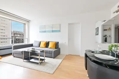 Coin salon dans l'établissement Appartement Quartier Tour Eiffel 5 Free Netflix