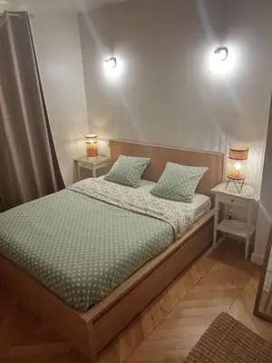 Un ou plusieurs lits dans un hébergement de l'établissement Appartement Paris 12 proche du centre avec parking