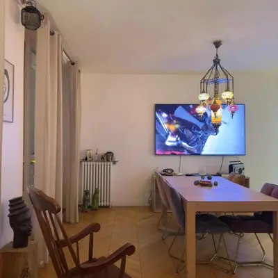 Télévision ou salle de divertissement dans l'établissement Appartement Paris 12 proche du centre avec parking