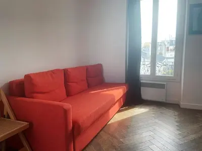 Coin salon dans l'établissement Beautiful and large apartment Paris Montparnasse