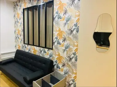 Coin salon dans l'établissement Appartement Paris 11 - 2 chambres - 2 sdd - 2 wc