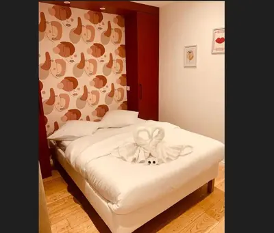 Un ou plusieurs lits dans un hébergement de l'établissement Appartement Paris 11 - 2 chambres - 2 sdd - 2 wc