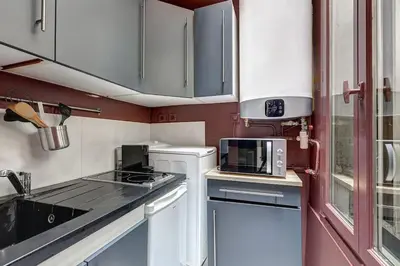 Cuisine ou kitchenette dans l'établissement Le Dark