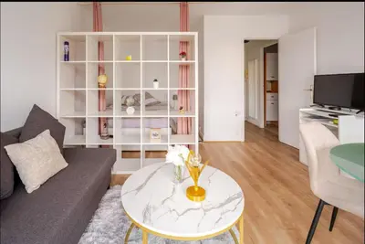 Télévision ou salle de divertissement dans l'établissement Bonito apartamento cerca De la Torre Eiffel