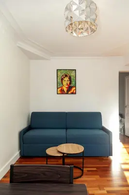 Coin salon dans l'établissement Charmant appartement - 4 couchages à proximité d'Opéra et des métros