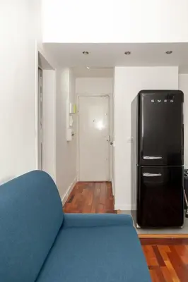 Coin salon dans l'établissement Charmant appartement - 4 couchages à proximité d'Opéra et des métros
