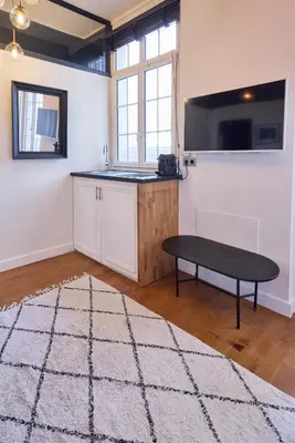Télévision ou salle de divertissement dans l'établissement Un Studio cosy au Cœur de Paris 17 Batignolles , Monceau