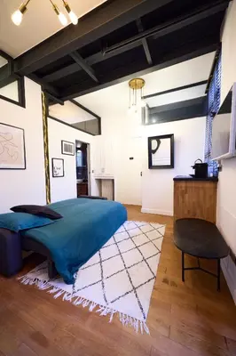 Un ou plusieurs lits dans un hébergement de l'établissement Un Studio cosy au Cœur de Paris 17 Batignolles , Monceau