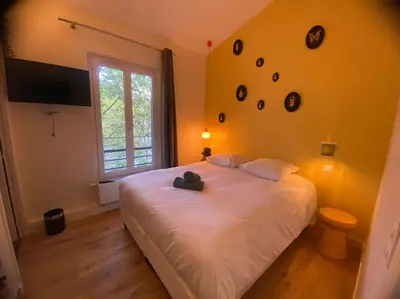 Un ou plusieurs lits dans un hébergement de l'établissement Saint Jacques Zoo