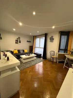 Coin salon dans l'établissement Cosy logement entier à Asnières sur Seine