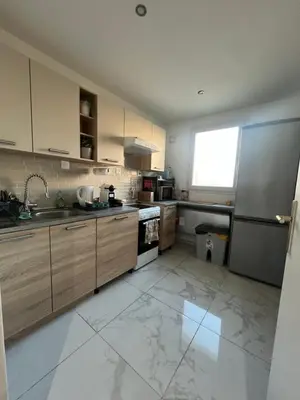 Cuisine ou kitchenette dans l'établissement Cosy logement entier à Asnières sur Seine